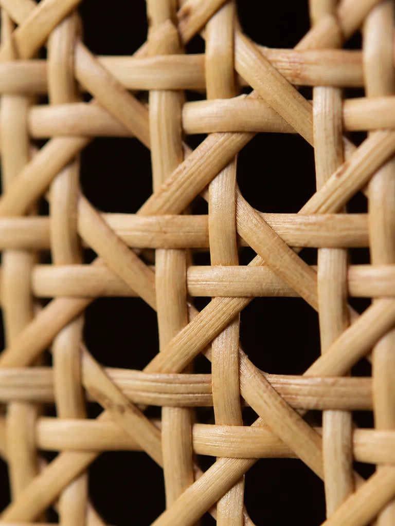 Professional decor construction macro in 3:4 portrait format, isolating the natural rattan cane webb